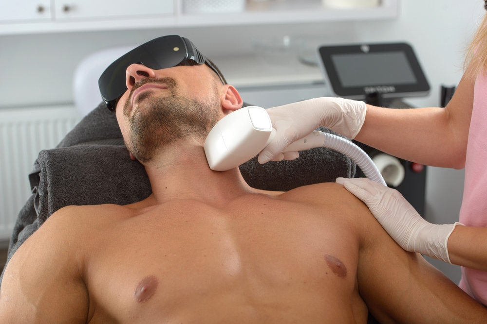 Laser,Hair,Removal,On,Mans,Neck.,Man,In,A,Goggles.